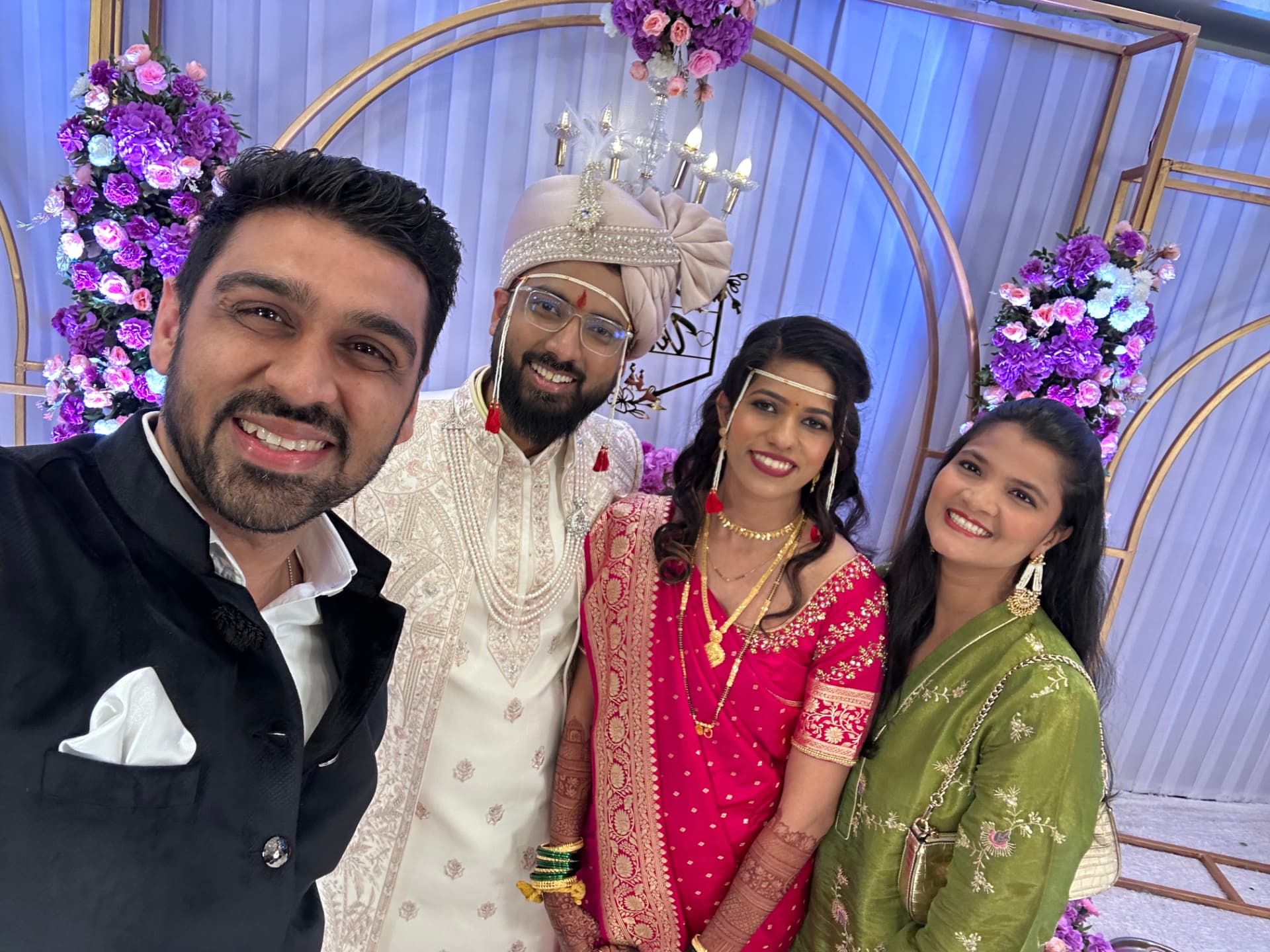 Pranali celebrating with a newlywed couple